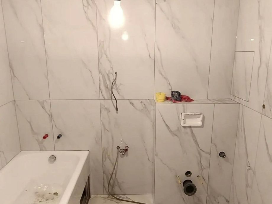 Укладка керамогранита в Санузле на Московском пр. 1