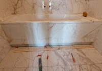 Укладка крупноформатного керамогранита в санузле на  ул. Полозова 5