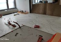 Укладка крупноформатного керамогранита на пол на наб. Мартынова 2